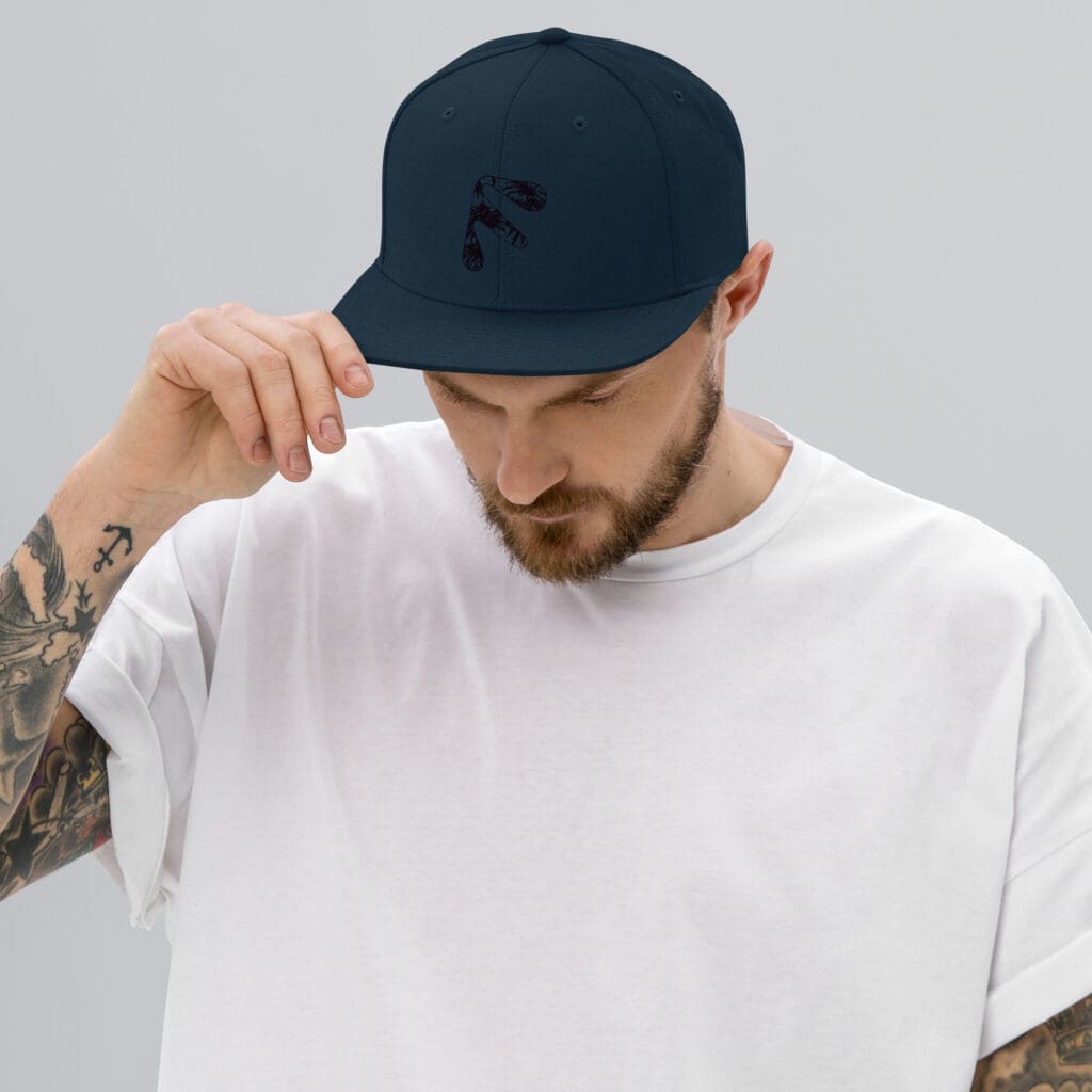 Male model wearing Dark Navy Friendly Snapback Hat - Black